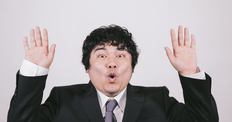 あっと驚くビジネスマンの写真