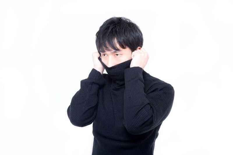 ひとつウエを目指す男性の写真