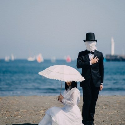覆面男子とお嬢様の写真