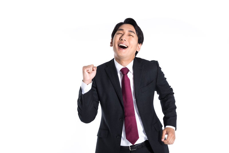 嬉しい反応がよくわかる会社員の写真